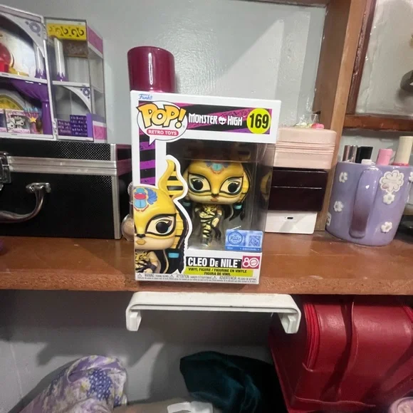 Funko Pop! Cleo de Nile Vinyl Figure - Yellow & Black with Teal Accents - Picture 2 of 5